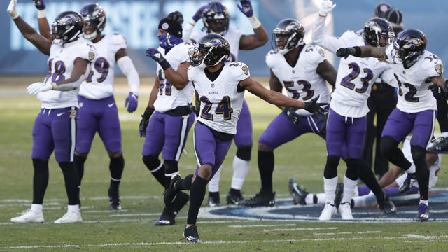 NASHVILLE, TENNESSEE - JANUARY 10: Cornerback Marcus Peters #24 of the Baltimore Ravens celebrates following an interception during the fourth quarter of their AFC Wild Card Playoff game against the Tennessee Titans at Nissan Stadium on January 10, 2021 in Nashville, Tennessee.