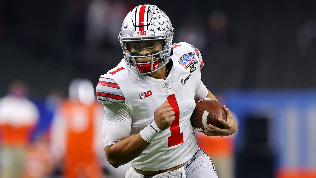 NEW ORLEANS, LOUISIANA - JANUARY 01: Justin Fields #1 of the Ohio State Buckeyes runs with the ball in the first half against the Clemson Tigers during the College Football Playoff semifinal game at the Allstate Sugar Bowl at Mercedes-Benz Superdome on January 01, 2021 in New Orleans, Louisiana.