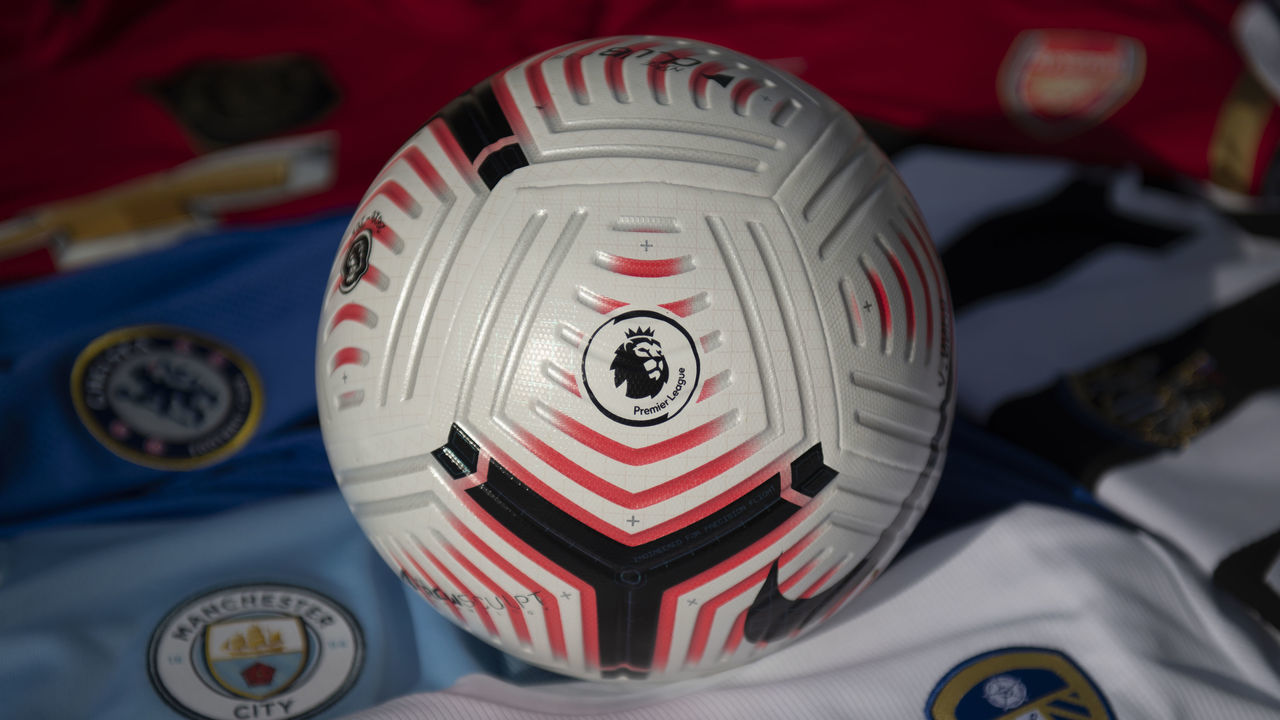MANCHESTER, ENGLAND - OCTOBER 14: The Official Nike Premier League match ball for the 2020/21 season with Premier League club shirts on October 14, 2020 in Manchester, United Kingdom.