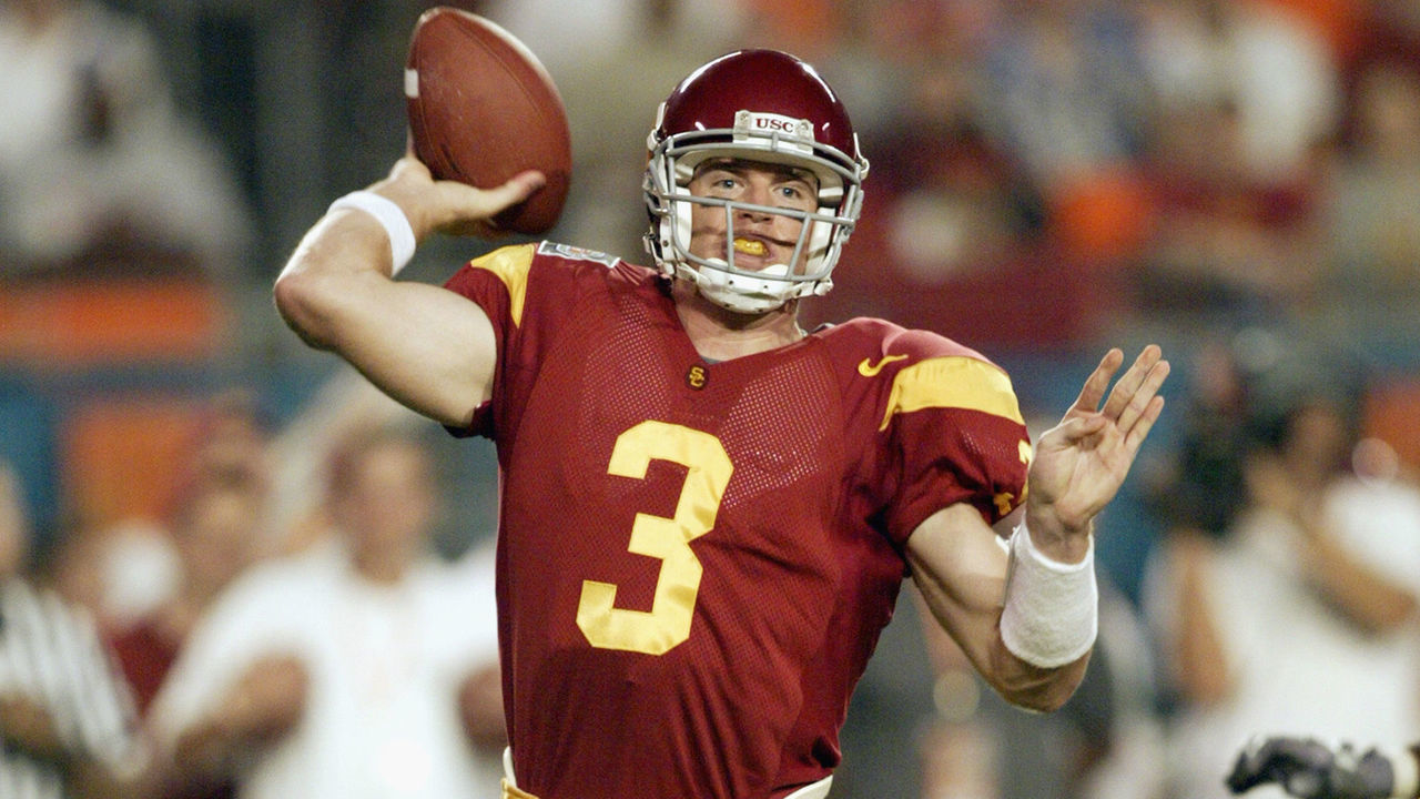 MIAMI - JANUARY 2: Quarterback Carson Palmer #3 of USC passes against Iowa during the FedEx Orange Bowl at Pro Player Stadium on January 2, 2003 in Miami, Florida. The University of Southern California Trojans defeated the Iowa Hawkeyes 38-17.