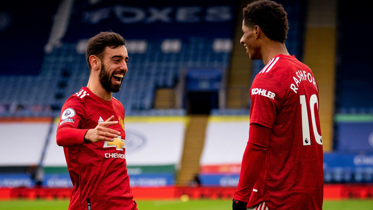 LEICESTER, ENGLAND - DECEMBER 26: Marcus Rashford of Manchester United celebrates scoring a goal to make the score 0-1 with Bruno Fernandes during the Premier League match between Leicester City and Manchester United at The King Power Stadium on December 26, 2020 in Leicester, United Kingdom. The match will be played without fans, behind closed doors as a Covid-19 precaution.