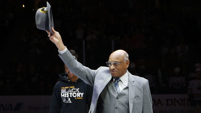 ANAHEIM, CA - FEBRUARY 25: Former NHL player, Willie O'Ree waves to the crowd during a pre-game ceremony prior to the opening face-off between the Anaheim Ducks and the Edmonton Oilers at Honda Center on February 25, 2020 in Anaheim, California.