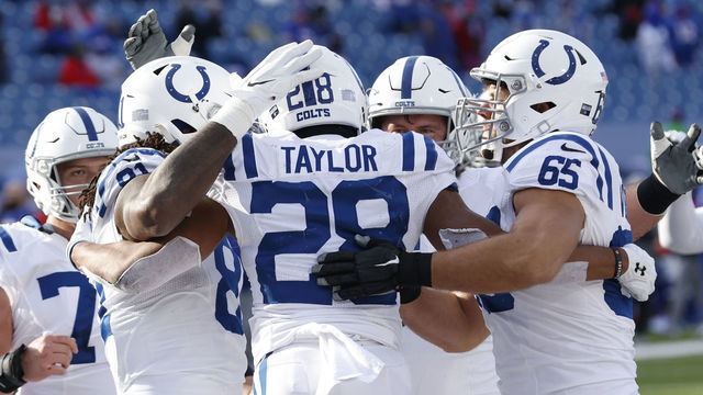 ORCHARD PARK, NEW YORK - JANUARY 09: The Indianapolis Colts celebrate after Jonathan Taylor #28 scored a touchdown during the first half of the AFC Wild Card playoff game against the Buffalo Bills at Bills Stadium on January 09, 2021 in Orchard Park, New York.