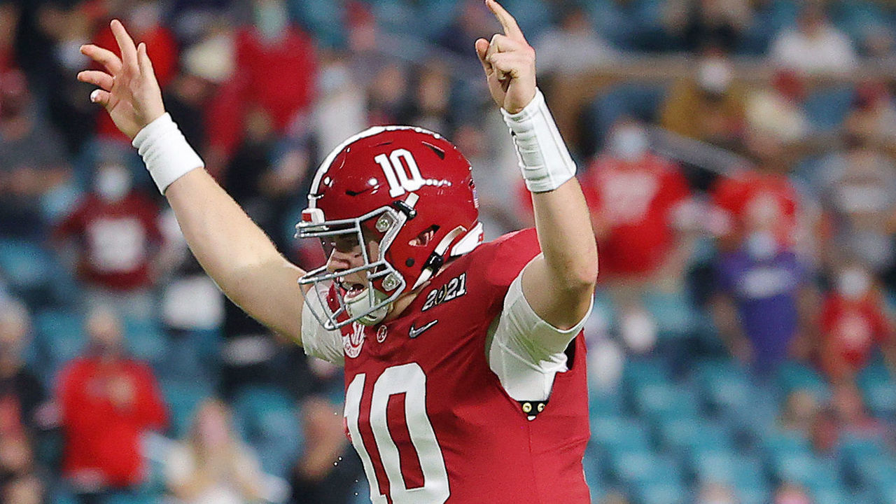 MIAMI GARDENS, FLORIDA - JANUARY 11: Mac Jones #10 of the Alabama Crimson Tide reacts to a touchdown during the first quarter of the College Football Playoff National Championship game against the Ohio State Buckeyes at Hard Rock Stadium on January 11, 2021 in Miami Gardens, Florida.
