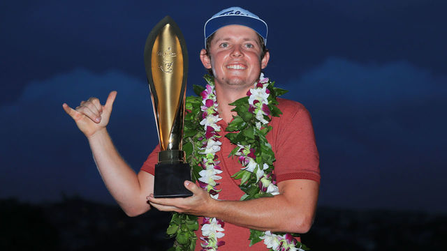 HONOLULU, HAWAII - JANUARY 12: Cameron Smith of Australia celebrates with the winner's trophy after the final round of the Sony Open in Hawaii at the Waialae Country Club on January 12, 2020 in Honolulu, Hawaii.