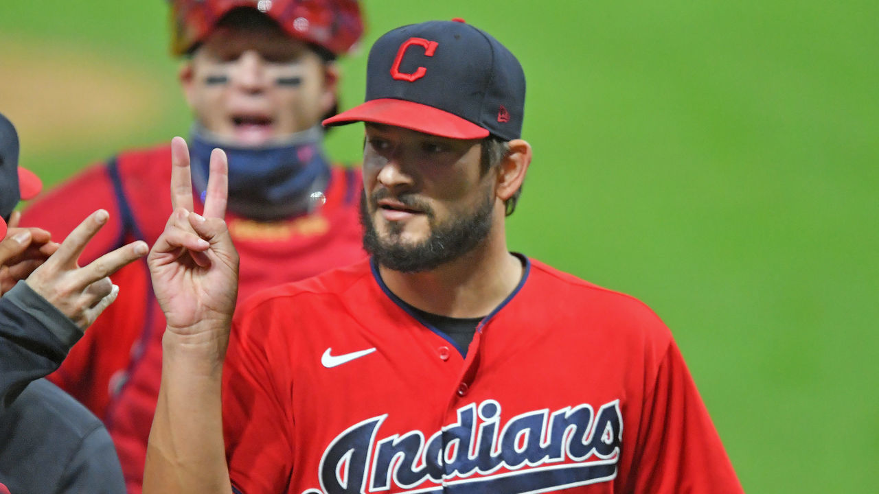 CLEVELAND, OHIO - SEPTEMBER 21: Brad Hand #33 of the Cleveland Indians celebrates after the Indians defeated the Chicago White Sox at Progressive Field on September 21, 2020 in Cleveland, Ohio. The Indians defeated the White Sox 6-4.