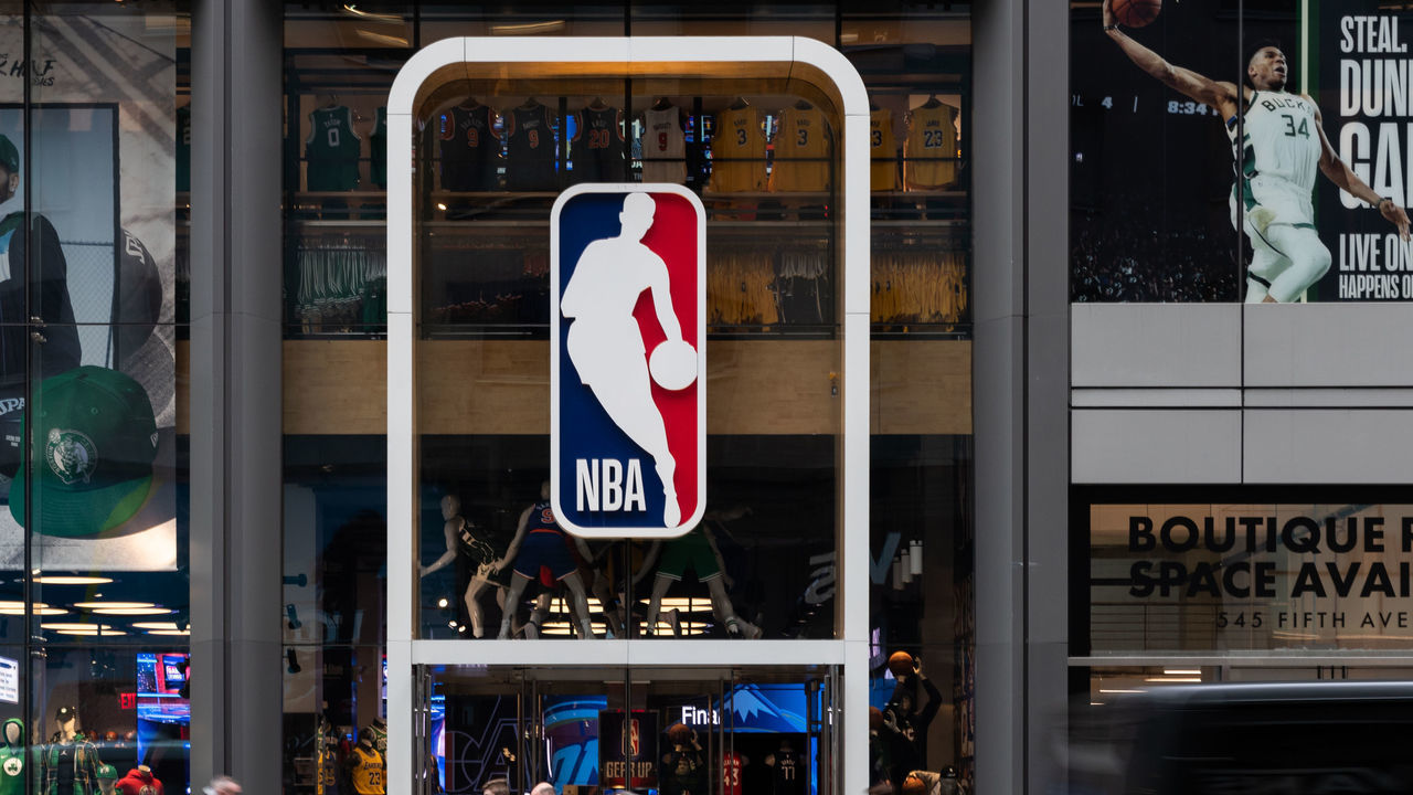 NEW YORK, NY - MARCH 12: An NBA logo is shown at the 5th Avenue NBA store on March 12, 2020 in New York City. The National Basketball Association said they would suspend all games after player Rudy Gobert of the Utah Jazz reportedly tested positive for the coronavirus.