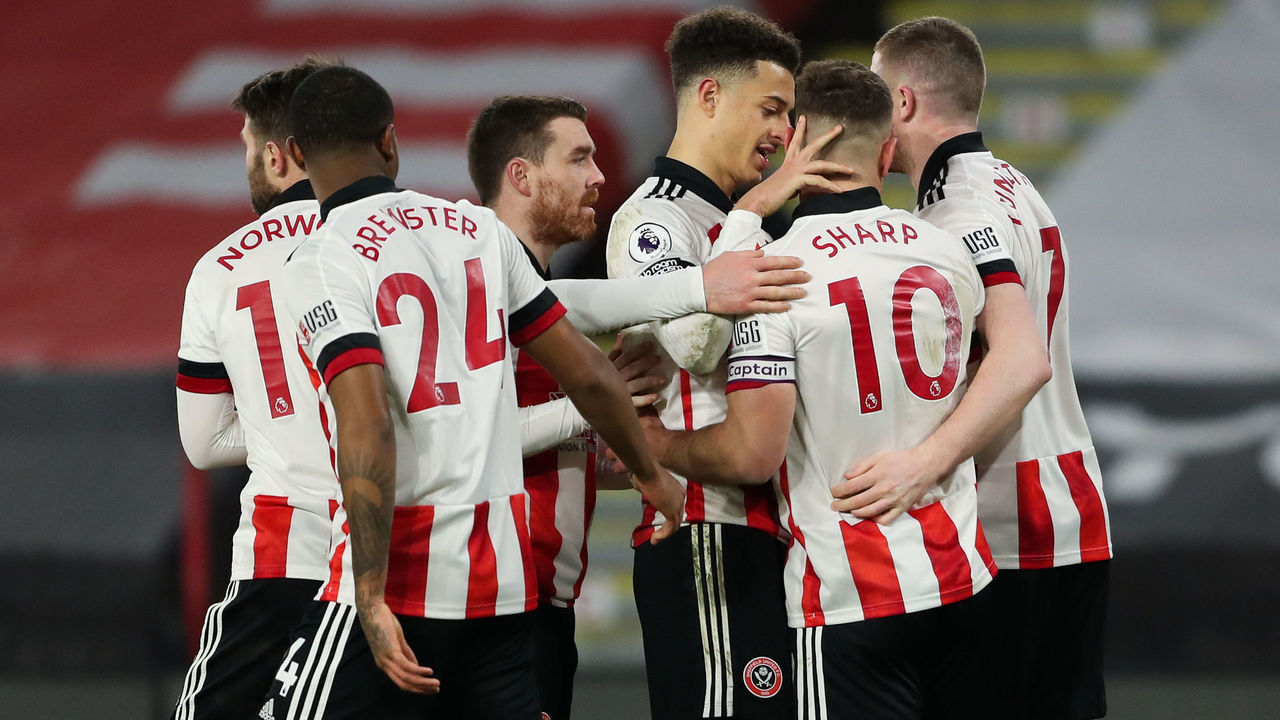 SHEFFIELD, ENGLAND - JANUARY 12: Billy Sharp of Sheffield United celebrates after scoring a goal to make it 1-0 during the Premier League match between Sheffield United and Newcastle United at Bramall Lane on January 12, 2021 in Sheffield, United Kingdom. Sporting stadiums around England remain under strict restrictions due to the Coronavirus Pandemic as Government social distancing laws prohibit fans inside venues resulting in games being played behind closed doors.