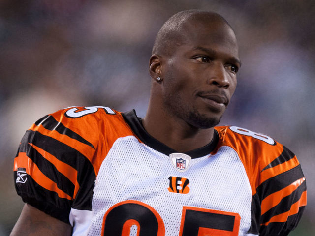 EAST RUTHERFORD, NJ - NOVEMBER 25: Chad Ochocinco #85 of the Cincinnati Bengals looks on from the bench during the game against the New York Jets on November 25, 2010 at the New Meadowlands Stadium in East Rutherford, New Jersey.The Jets defeated the Bengals 26 to 10.