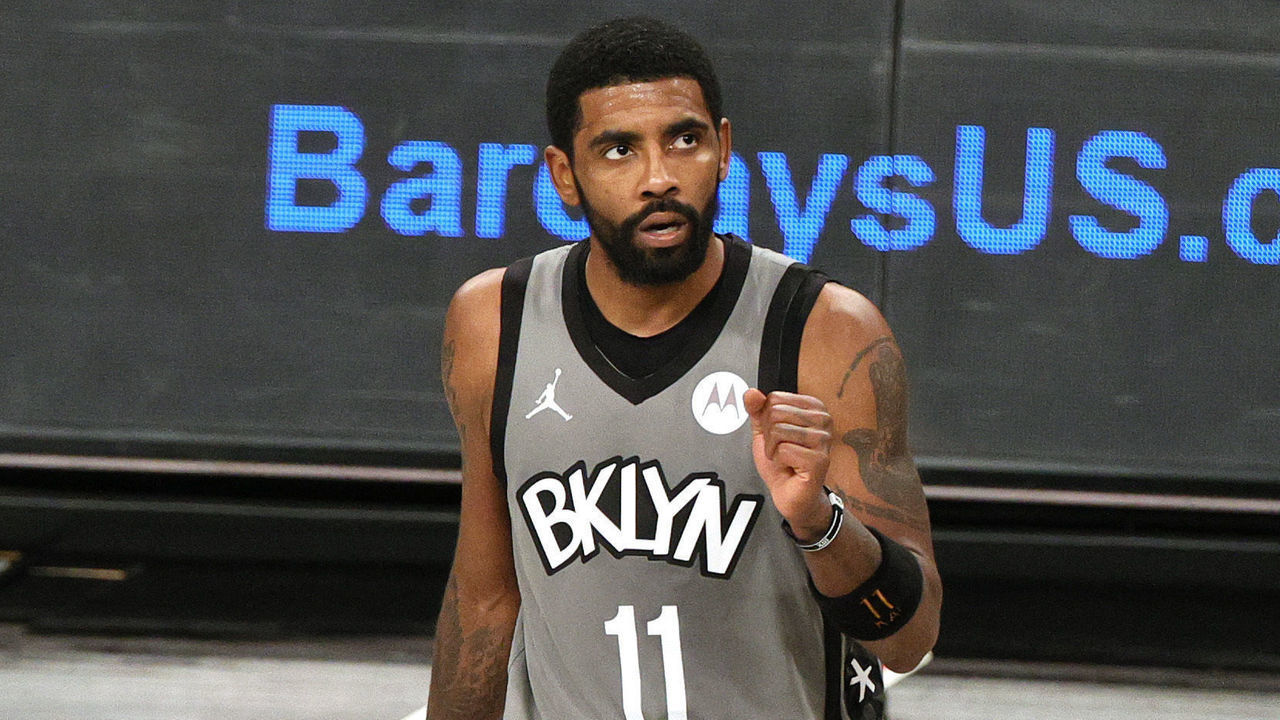 NEW YORK, NEW YORK - JANUARY 03: Kyrie Irving #11 of the Brooklyn Nets reacts during the second half against the Washington Wizards at Barclays Center on January 03, 2021 in the Brooklyn borough of New York City. The Wizards won 123-122. NOTE TO USER: User expressly acknowledges and agrees that, by downloading and/or using this Photograph, user is consenting to the terms and conditions of the Getty Images License Agreement.