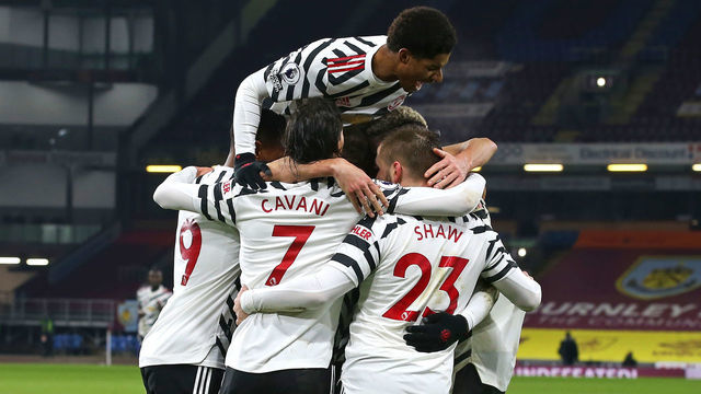 BURNLEY, ENGLAND - JANUARY 12: Paul Pogba of Manchester United celebrates scoring a goal to make the score 0-1 with his team-mates during the Premier League match between Burnley and Manchester United at Turf Moor on January 12, 2021 in Burnley, United Kingdom. Sporting stadiums around England remain under strict restrictions due to the Coronavirus Pandemic as Government social distancing laws prohibit fans inside venues resulting in games being played behind closed doors.
