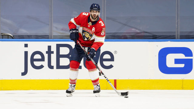 TORONTO, ONTARIO - AUGUST 05: Keith Yandle #3 of the Florida Panthers plays the puck against the New York Islanders during the first period in Game Three of the Eastern Conference Qualification Round at Scotiabank Arena on August 05, 2020 in Toronto, Ontario.