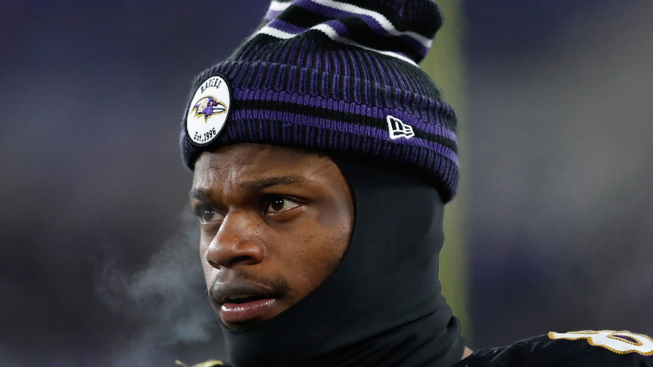 BALTIMORE, MARYLAND - DECEMBER 12: Quarterback Lamar Jackson #8 of the Baltimore Ravens looks on from the sidelines during the game against the New York Jets at M&T Bank Stadium on December 12, 2019 in Baltimore, Maryland.