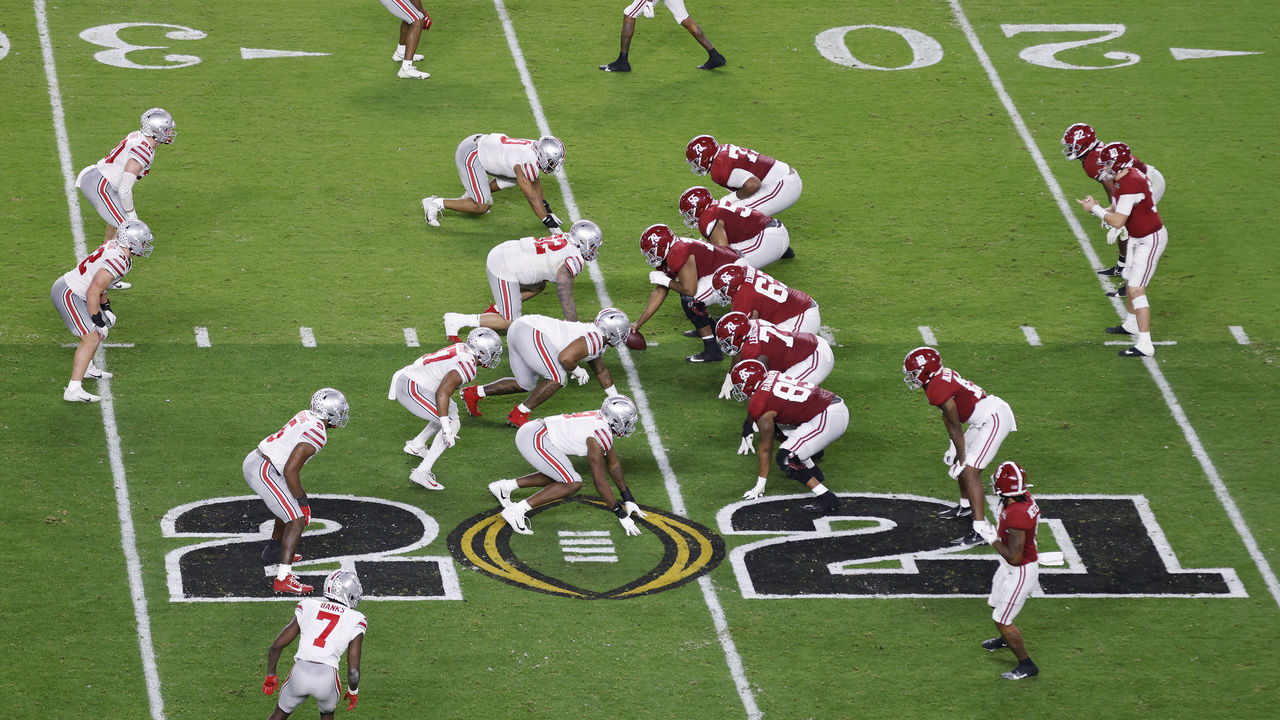 MIAMI GARDENS, FLORIDA - JANUARY 11: Mac Jones #10 of the Alabama Crimson Tide waits for the snap against the Ohio State Buckeyes during the second quarter of the College Football Playoff National Championship game at Hard Rock Stadium on January 11, 2021 in Miami Gardens, Florida.