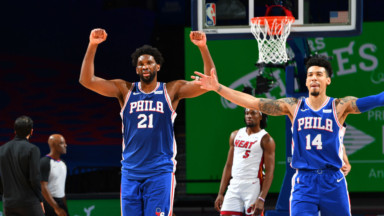 PHILADELPHIA, PA - JANUARY 12: Joel Embiid #21 and Danny Green #14 of the Philadelphia 76ers celebrate during the game against the Miami Heat on January 12, 2021 at the Wells Fargo Center in Philadelphia, Pennsylvania NOTE TO USER: User expressly acknowledges and agrees that, by downloading and/or using this Photograph, user is consenting to the terms and conditions of the Getty Images License Agreement. Mandatory Copyright Notice: Copyright 2021 NBAE