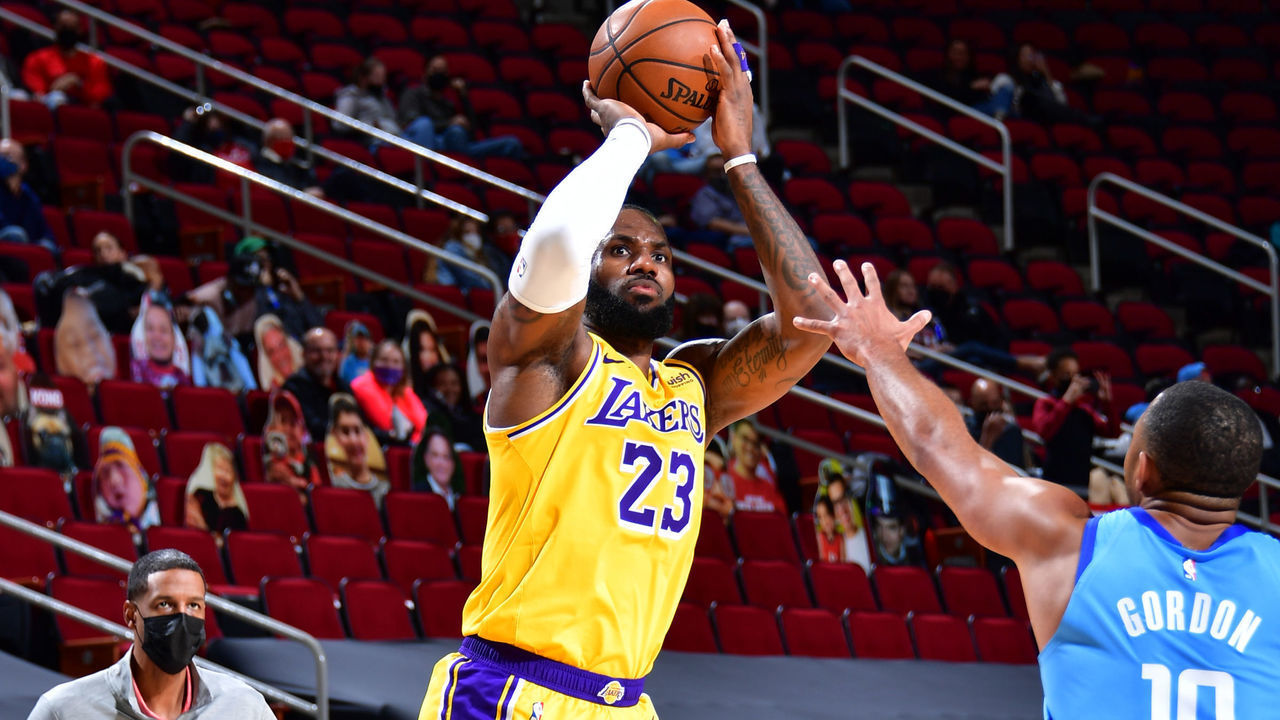 HOUSTON, TX - JANUARY 12: LeBron James #23 of the Los Angeles Lakers shoots a three point basket during the game against the Houston Rockets on January 12, 2021 at the Toyota Center in Houston, Texas. Mandatory Copyright Notice: Copyright 2021 NBAE