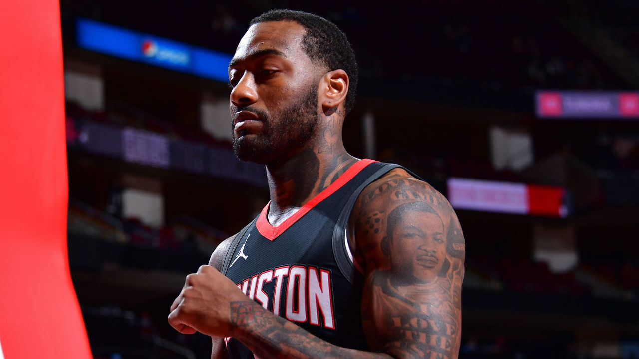 HOUSTON, TX - JANUARY 4: John Wall #1 of the Houston Rockets looks on during the game against the Dallas Mavericks on January 4, 2021 at the Toyota Center in Houston, Texas. Mandatory Copyright Notice: Copyright 2021 NBAE