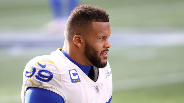 SEATTLE, WASHINGTON - JANUARY 09: Aaron Donald #99 of the Los Angeles Rams looks on the NFC Wild Card Playoff game against the Seattle Seahawks at Lumen Field on January 09, 2021 in Seattle, Washington.