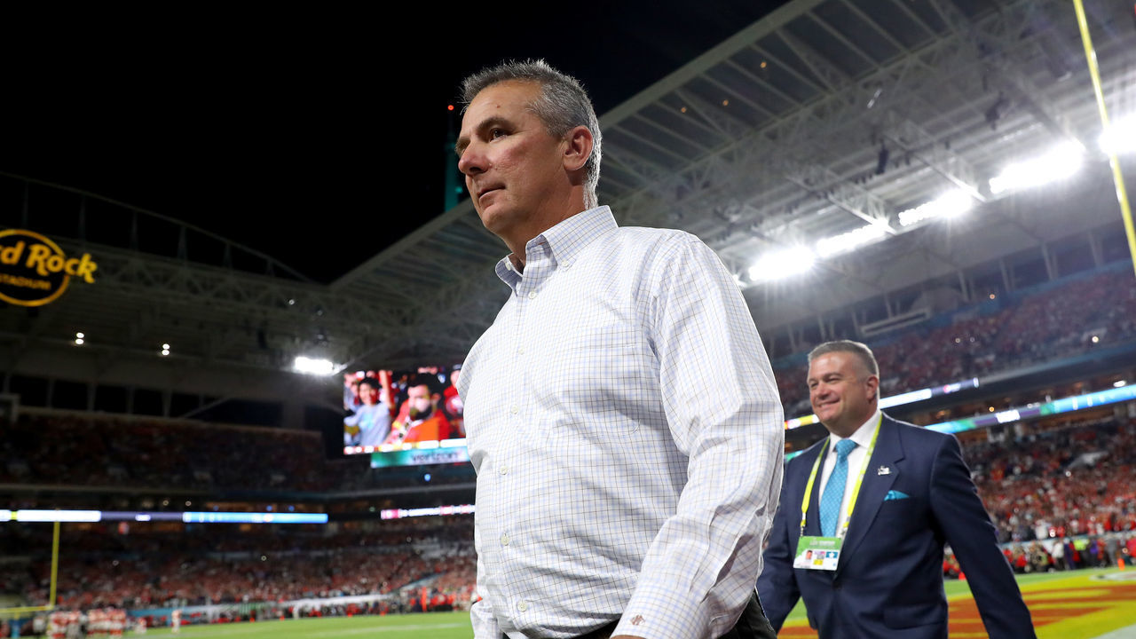 MIAMI, FLORIDA - FEBRUARY 02: Urban Meyer walks on the field in Super Bowl LIV at Hard Rock Stadium on February 02, 2020 in Miami, Florida.