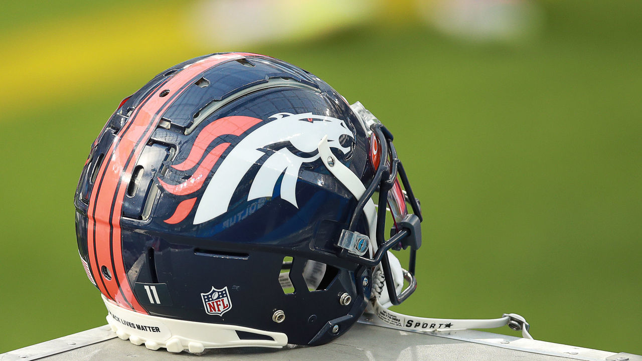 INGLEWOOD, CALIFORNIA - DECEMBER 27: A Denver Broncos helmet sits on the bench before the start of the game between the Los Angeles Chargers and the Denver Broncos at SoFi Stadium on December 27, 2020 in Inglewood, California.