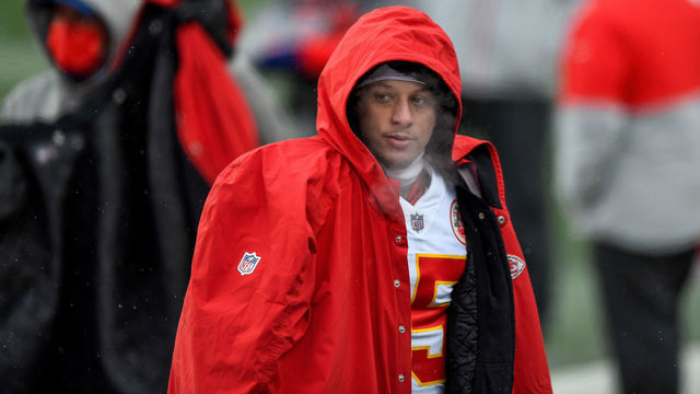 DENVER, CO - OCTOBER 25: Patrick Mahomes #15 of the Kansas City Chiefs looks on as he wears a heavy jacket in the bench area during a game against the Denver Broncos at Empower Field at Mile High on October 25, 2020 in Denver, Colorado.