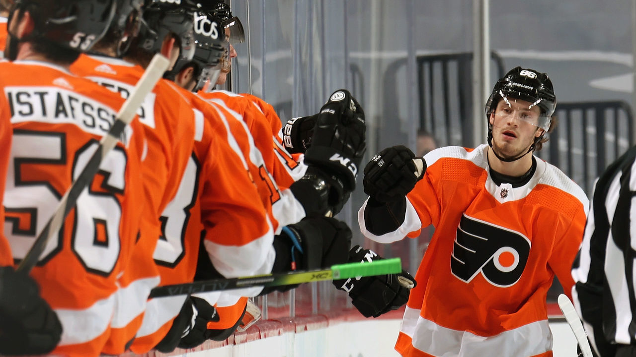 PHILADELPHIA, PA - JANUARY 13: Joel Farabee #86 of the Philadelphia Flyers celebrates his second period goal against the Pittsburgh Penguins with his teammates on the bench on January 13, 2021 at the Wells Fargo Center in Philadelphia, Pennsylvania.