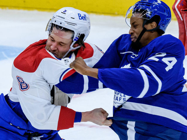 TORONTO, ON - JANUARY 13: Toronto Maple Leafs Right Wing Wayne Simmonds (24) fights Montreal Canadiens Defenceman Ben Chiarot (8) during the second period of the NHL regular season game between the Montreal Canadiens and the Toronto Maple Leafs on January 13, 2021, at Scotiabank Arena in Toronto, ON, Canada.
