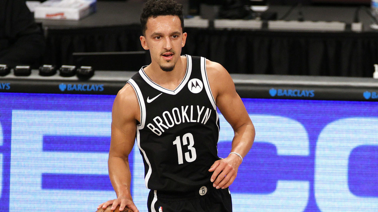 NEW YORK, NEW YORK - JANUARY 01: Landry Shamet #13 of the Brooklyn Nets dribbles during the second half against the Atlanta Hawks at Barclays Center on January 01, 2021 in the Brooklyn borough of New York City. The Hawks won 114-96. NOTE TO USER: User expressly acknowledges and agrees that, by downloading and/or using this Photograph, user is consenting to the terms and conditions of the Getty Images License Agreement.