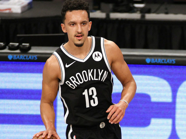 NEW YORK, NEW YORK - JANUARY 01: Landry Shamet #13 of the Brooklyn Nets dribbles during the second half against the Atlanta Hawks at Barclays Center on January 01, 2021 in the Brooklyn borough of New York City. The Hawks won 114-96. NOTE TO USER: User expressly acknowledges and agrees that, by downloading and/or using this Photograph, user is consenting to the terms and conditions of the Getty Images License Agreement.
