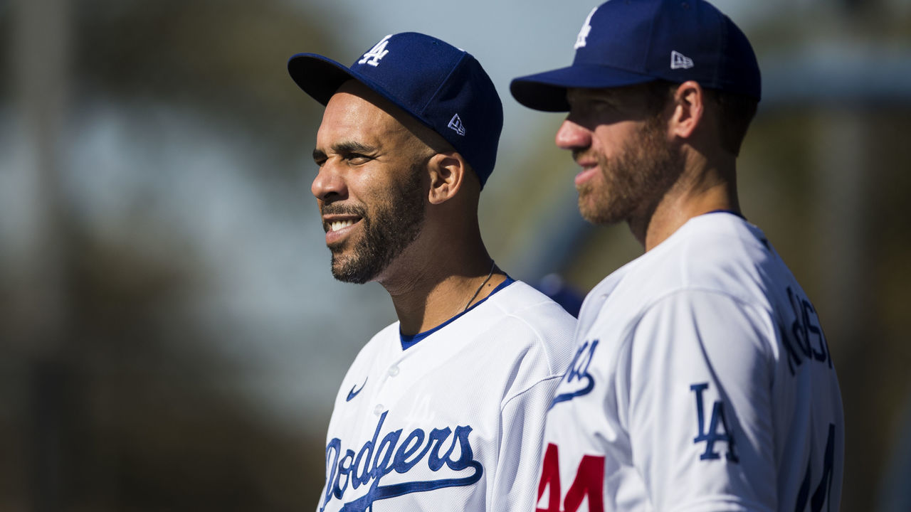 GLENDALE, AZ - FEBRUARY 20: David Price #33 and Zach McAllister #44 of the Los Angeles Dodgers look on during a workout after Photo Day on Thursday, February 20, 2020 at Camelback Ranch in Glendale, Arizona.