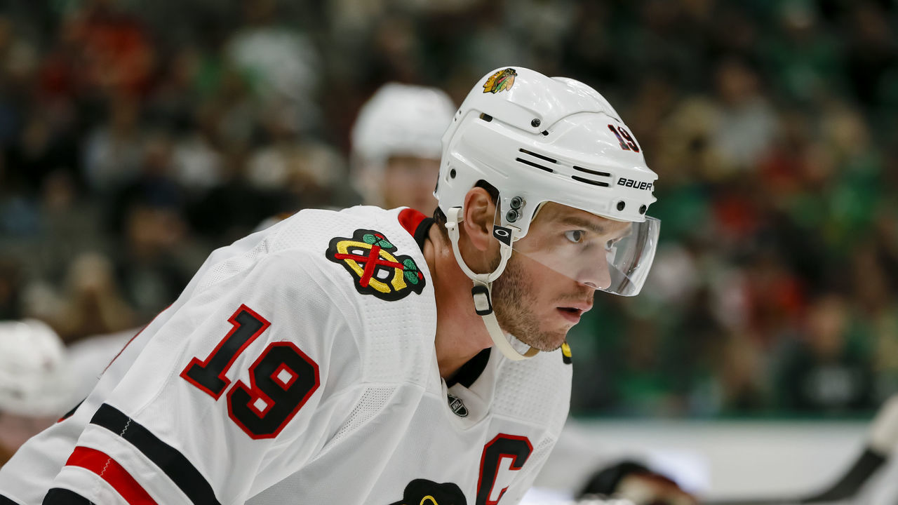 DALLAS, TX - FEBRUARY 23: Chicago Blackhawks center Jonathan Toews (19) waits for the puck to drop during the game between the Dallas Stars and the Chicago Blackhawks on February 23, 2020 at American Airlines Center in Dallas, Texas.