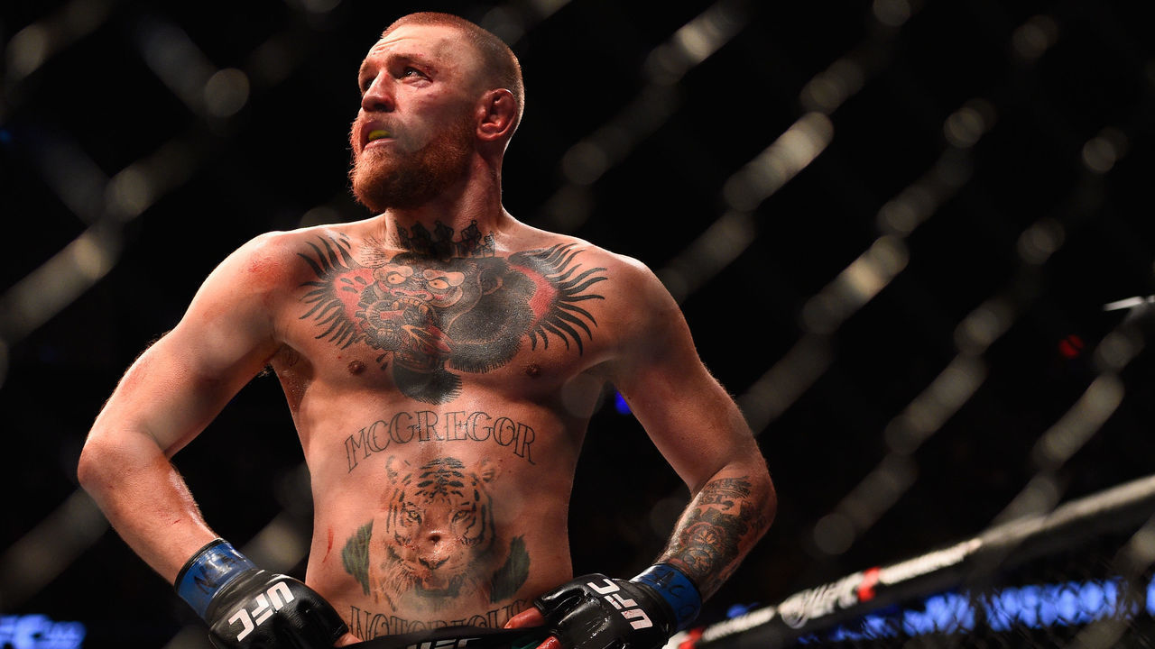 LAS VEGAS, NV - AUGUST 20: Conor McGregor of Ireland walks to his corner between rounds against Nate Diaz in their welterweight bout during the UFC 202 event at T-Mobile Arena on August 20, 2016 in Las Vegas, Nevada.