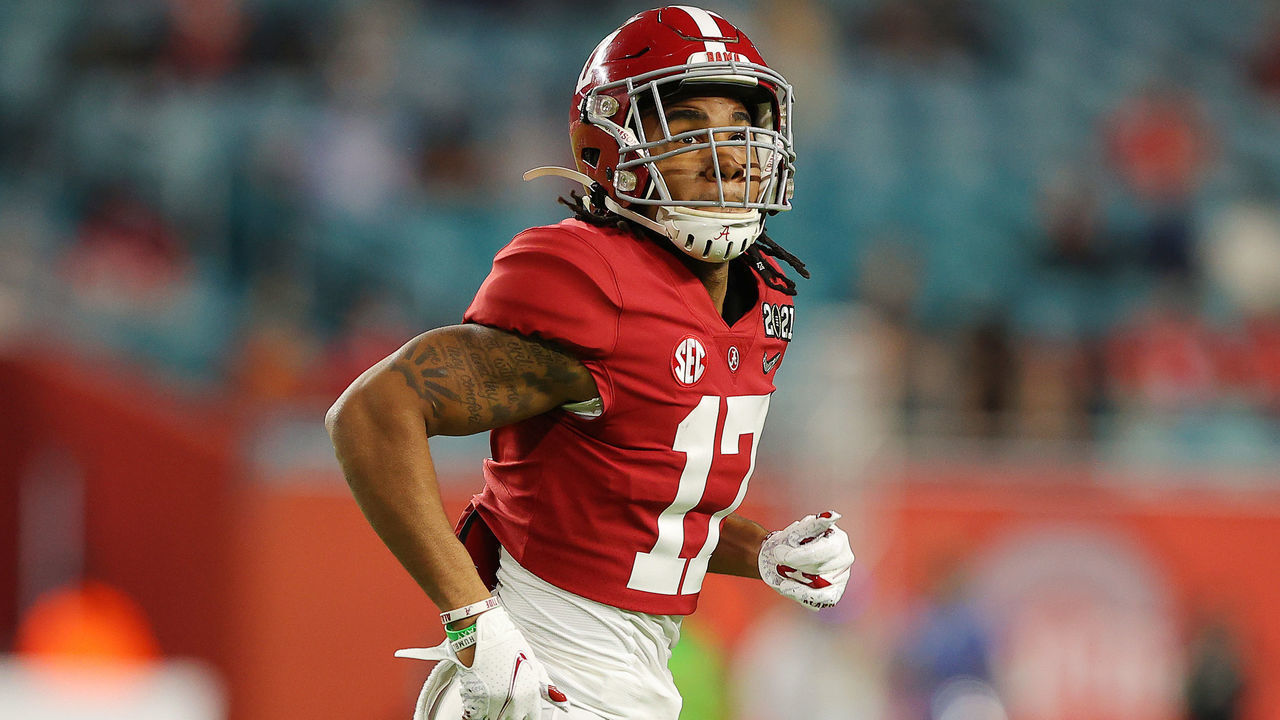 MIAMI GARDENS, FLORIDA - JANUARY 11: Jaylen Waddle #17 of the Alabama Crimson Tide looks on during the first quarter of the College Football Playoff National Championship game against the Ohio State Buckeyes at Hard Rock Stadium on January 11, 2021 in Miami Gardens, Florida.