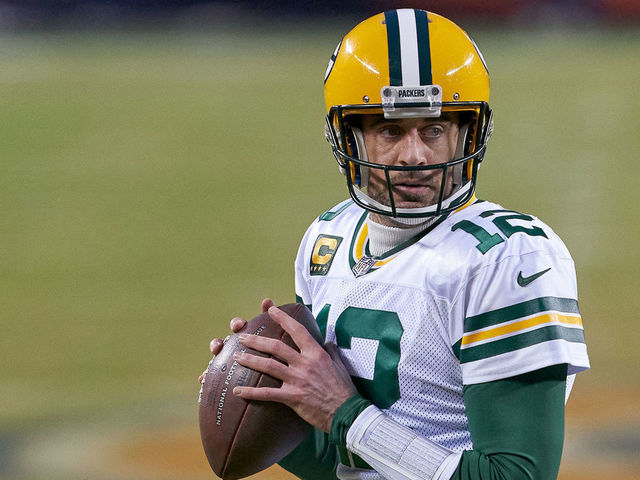 CHICAGO, IL - JANUARY 03: Green Bay Packers quarterback Aaron Rodgers (12) handles the football in action during a game between the Chicago Bears and the Green Bay Packers on January 03, 2021 in Chicago, IL.