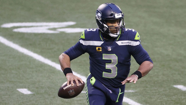 SEATTLE, WASHINGTON - JANUARY 09: Russell Wilson #3 of the Seattle Seahawks looks to pass against the Los Angeles Rams during the third quarter in an NFC Wild Card game at Lumen Field on January 09, 2021 in Seattle, Washington.