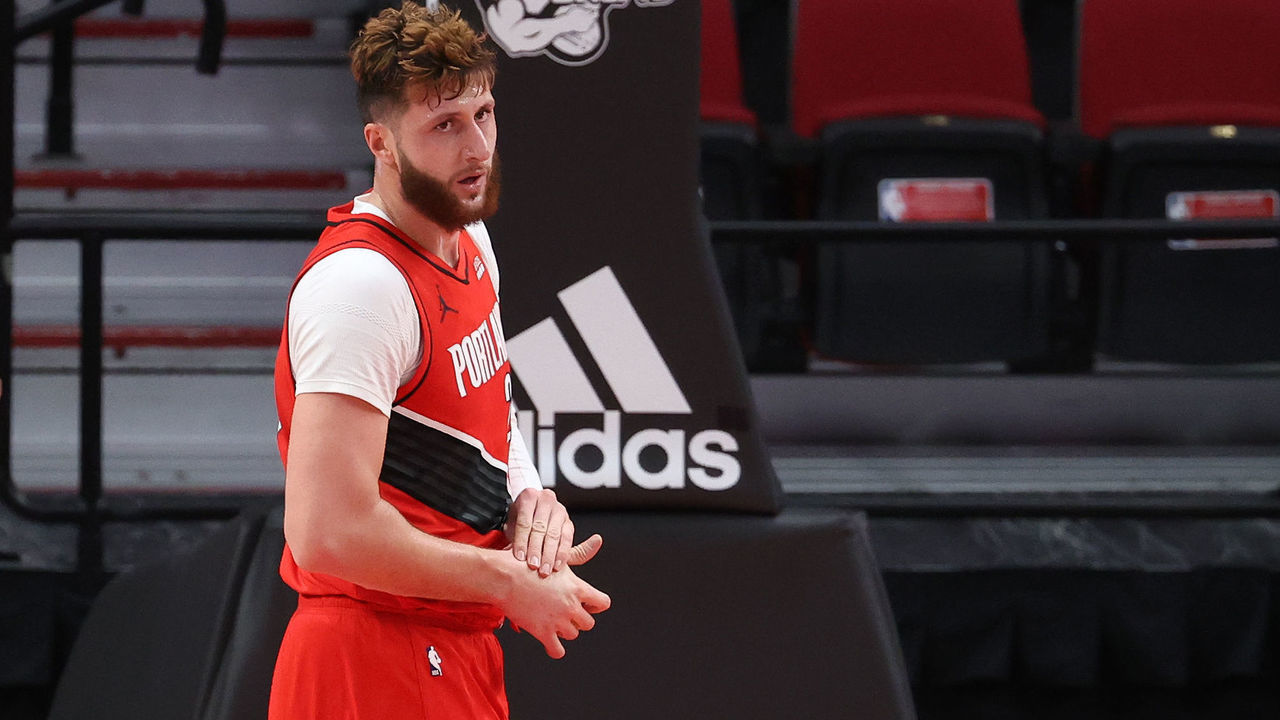 PORTLAND, OREGON - JANUARY 14: Jusuf Nurkic #27 of the Portland Trail Blazers holds his hand after injuring it in the third quarter against the Indiana Pacers at Moda Center on January 14, 2021 in Portland, Oregon.