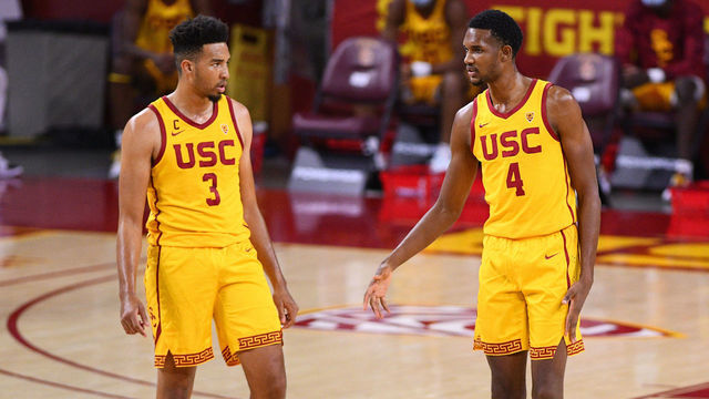 LOS ANGELES, CA - JANUARY 14: USC Trojans forward Isaiah Mobley (3) and USC Trojans forward Evan Mobley (4) look on during the college basketball game between the Washington Huskies and the USC Trojans on January 14, 2021 at Galen Center in Los Angeles, CA. The game was played without fans due to the COVID-19 pandemic.