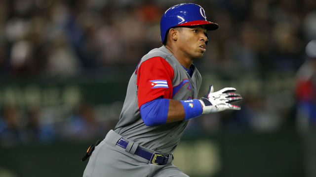 TOKYO, JAPAN- MARCH 7: Yoelqui Cespedes #16 of Team Cuba doubles in third inning during the Game 1 of Pool B against Team Japan at the Tokyo Dome on Tuesday, March 7, 2017 in Tokyo, Japan.