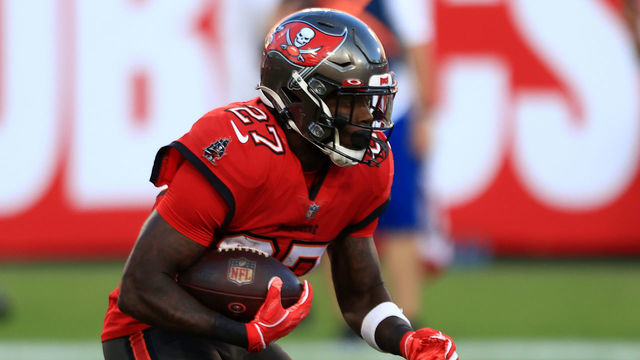 TAMPA, FLORIDA - NOVEMBER 29: Ronald Jones II #27 of the Tampa Bay Buccaneers carries the ball in the second quarter during their game against the Kansas City Chiefs at Raymond James Stadium on November 29, 2020 in Tampa, Florida.