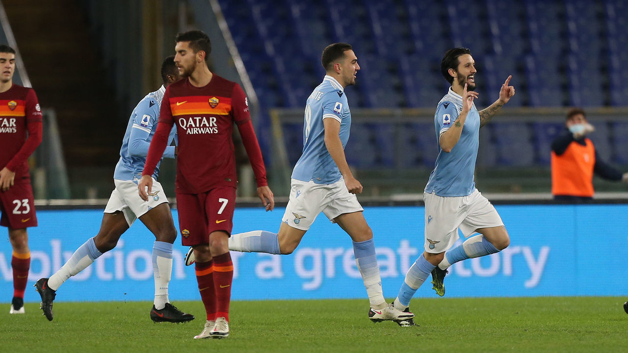 ROME, ITALY - JANUARY 15: Luis Alberto of Lazio celebrates with Jean-Daniel Akpa Akpro and Gonzalo Escalante after scoring his team's third goal during the Serie A match between SS Lazio and AS Roma at Stadio Olimpico on January 15, 2021 in Rome, Italy.