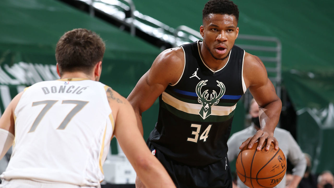 MILWAUKEE, WI - JANUARY 15: Giannis Antetokounmpo #34 of the Milwaukee Bucks handles the ball during the game against the Dallas Mavericks on January 15, 2021 at the Fiserv Forum Center in Milwaukee, Wisconsin. Mandatory Copyright Notice: Copyright 2021 NBAE .