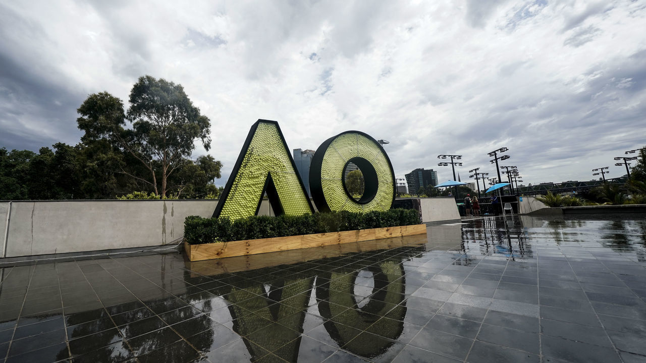 MELBOURNE, AUSTRALIA - JANUARY 18: Tennis balls inside an Australian Open logo sign ahead of day five of the 2019 Australian Open at Melbourne Park on January 18, 2019 in Melbourne, Australia.