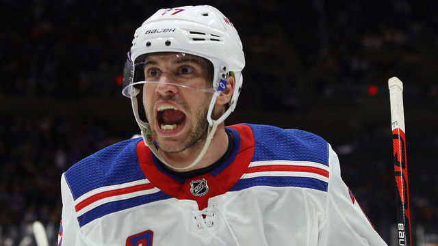NEW YORK, NEW YORK - FEBRUARY Tony DeAngelo #77 of the New York Rangers celebrates a first period goal by Artemi Panarin #10 against the New York Islanders at NYCB Live's Nassau Coliseum on February 25, 2020 in Uniondale, New York.