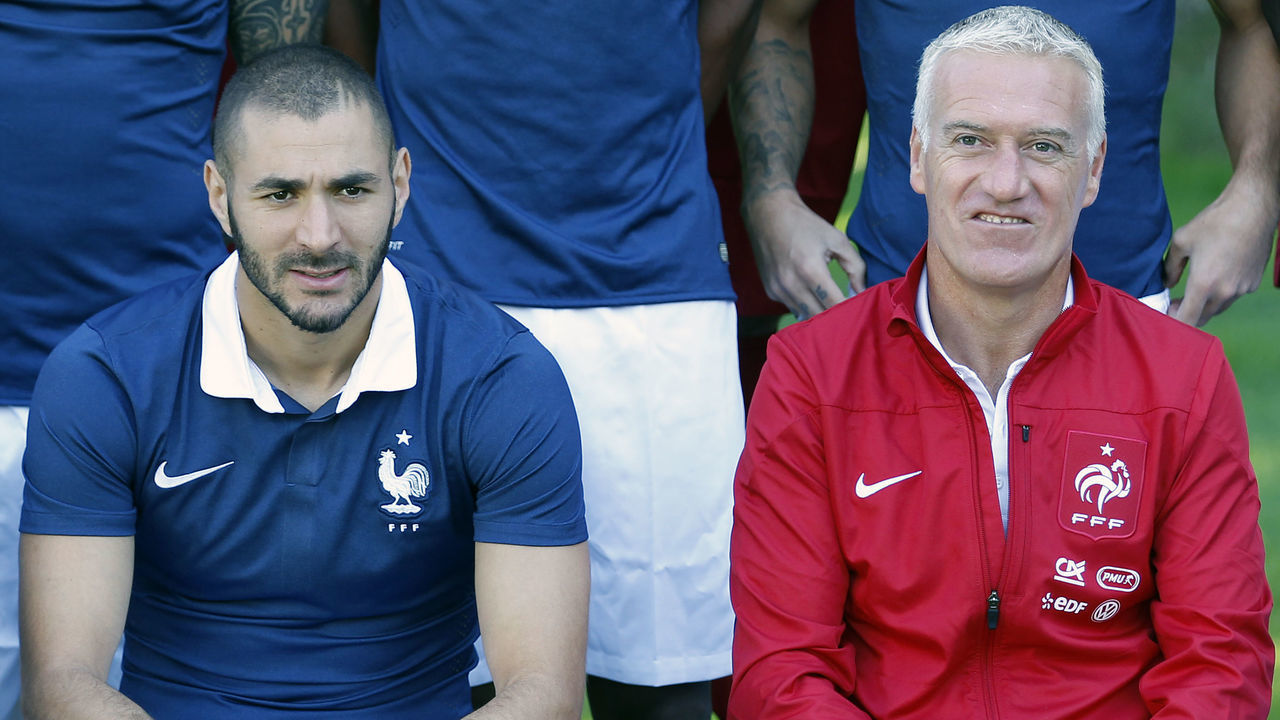 (L-R) Forward Karim Benzema and head coach Didier Deschamps pose for the French football team picture group at the French national football team's training base in Clairefontaine-en-Yvelines on September 2, 2014. France. France will play a friendly football match against Spain ahead of the Euro 2016 qualifiers. Photo by Justin Lorget/Corbis
