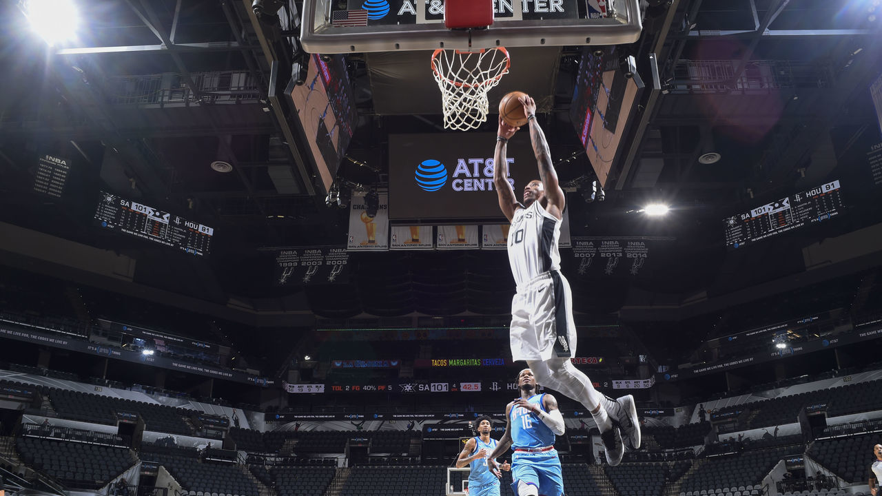 SAN ANTONIO, TX - JANUARY 16: DeMar DeRozan #10 of the San Antonio Spurs dunks the ball during the game against the Houston Rockets on January 16, 2021 at the AT&T Center in San Antonio, Texas. Mandatory Copyright Notice: Copyright 2021 NBAE (Photos by Logan Riely/NBAE via Getty Images)