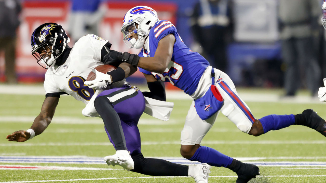ORCHARD PARK, NEW YORK - JANUARY 16: Levi Wallace #39 of the Buffalo Bills sacks Lamar Jackson #8 of the Baltimore Ravens in the first quarter during the AFC Divisional Playoff game at Bills Stadium on January 16, 2021 in Orchard Park, New York.