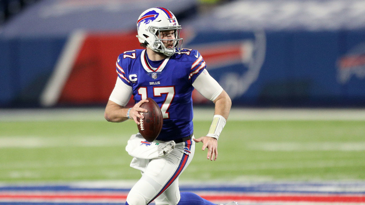 ORCHARD PARK, NEW YORK - JANUARY 16: Josh Allen #17 of the Buffalo Bills looks to pass in the first half against the Baltimore Ravens during the AFC Divisional Playoff game at Bills Stadium on January 16, 2021 in Orchard Park, New York.