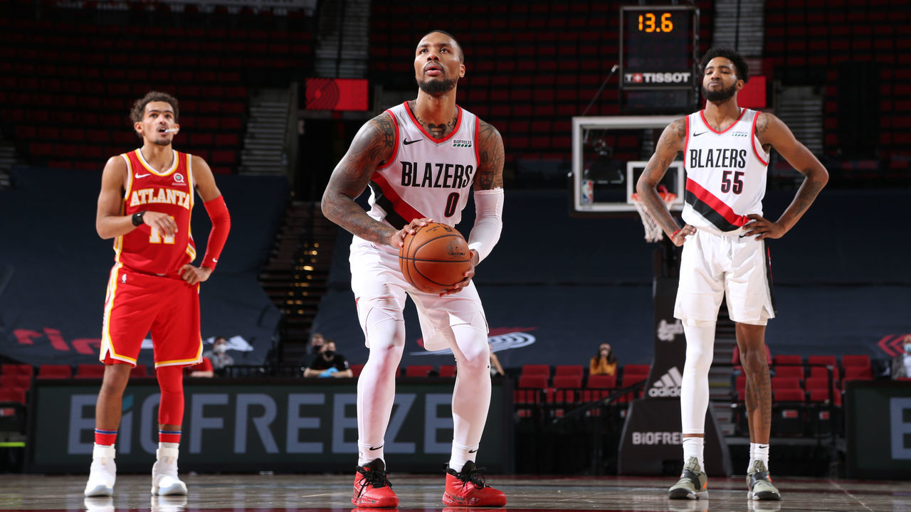 PORTLAND, OR - JANUARY 16: Damian Lillard #0 of the Portland Trail Blazers shoots the ball during the game against the Atlanta Hawks on January 16, 2021 at the Moda Center Arena in Portland, Oregon. Mandatory Copyright Notice: Copyright 2021 NBAE