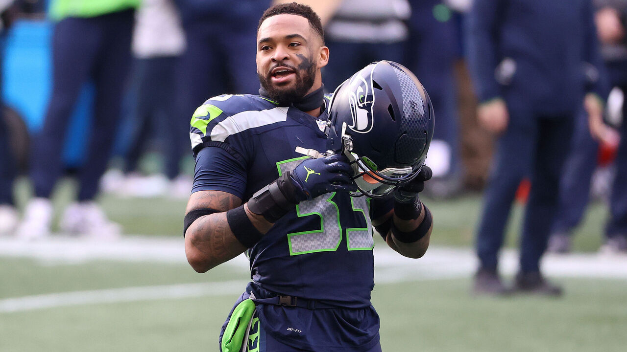 SEATTLE, WASHINGTON - JANUARY 09: Jamal Adams #33 of the Seattle Seahawks reacts in the first quarter against the Los Angeles Rams during the NFC Wild Card Playoff game at Lumen Field on January 09, 2021 in Seattle, Washington.