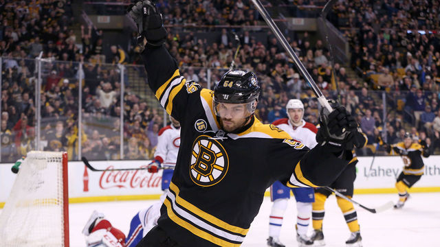 BOSTON - FEBRUARY 12: Boston Bruins defenseman Adam McQuaid (54) celebrates his goal against the Montreal Canadians during the first period. The Boston Bruins host the Montreal Canadians at TD Garden in Boston on Feb. 12, 2017.